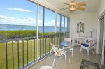 Glass & Screen Enclosed Balcony Overlooking Wide Water Riverfront